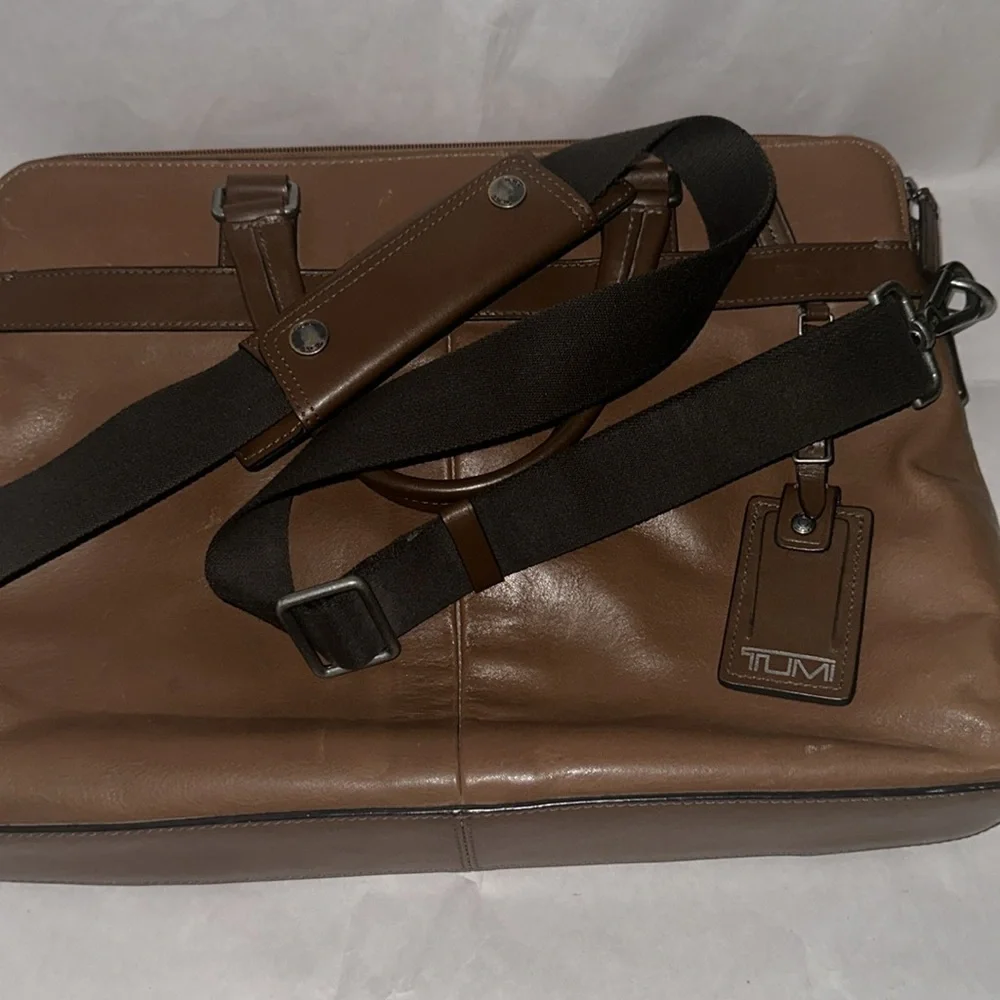 TUMI; Brown Leather Expandable Laptop Bag.